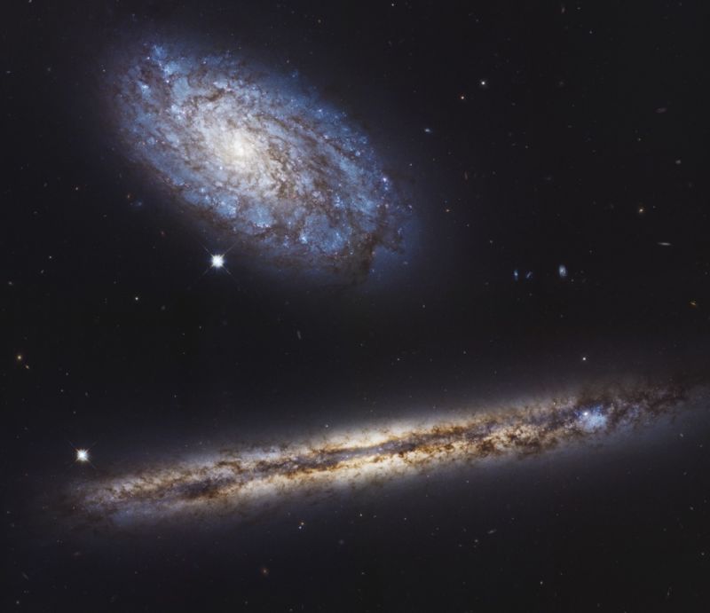 ngc4302_ngc4298-hst-6576x7614_print-800x691.jpg